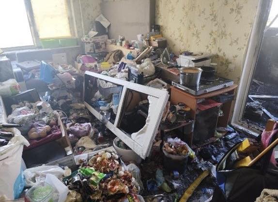 Під завалами сміття у Києві роками жила людина з важкою інвалідністю - фото 2